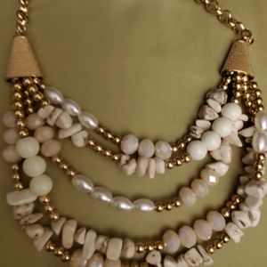 White and beige multi strand necklace